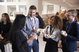 business minded people chatting at networking event